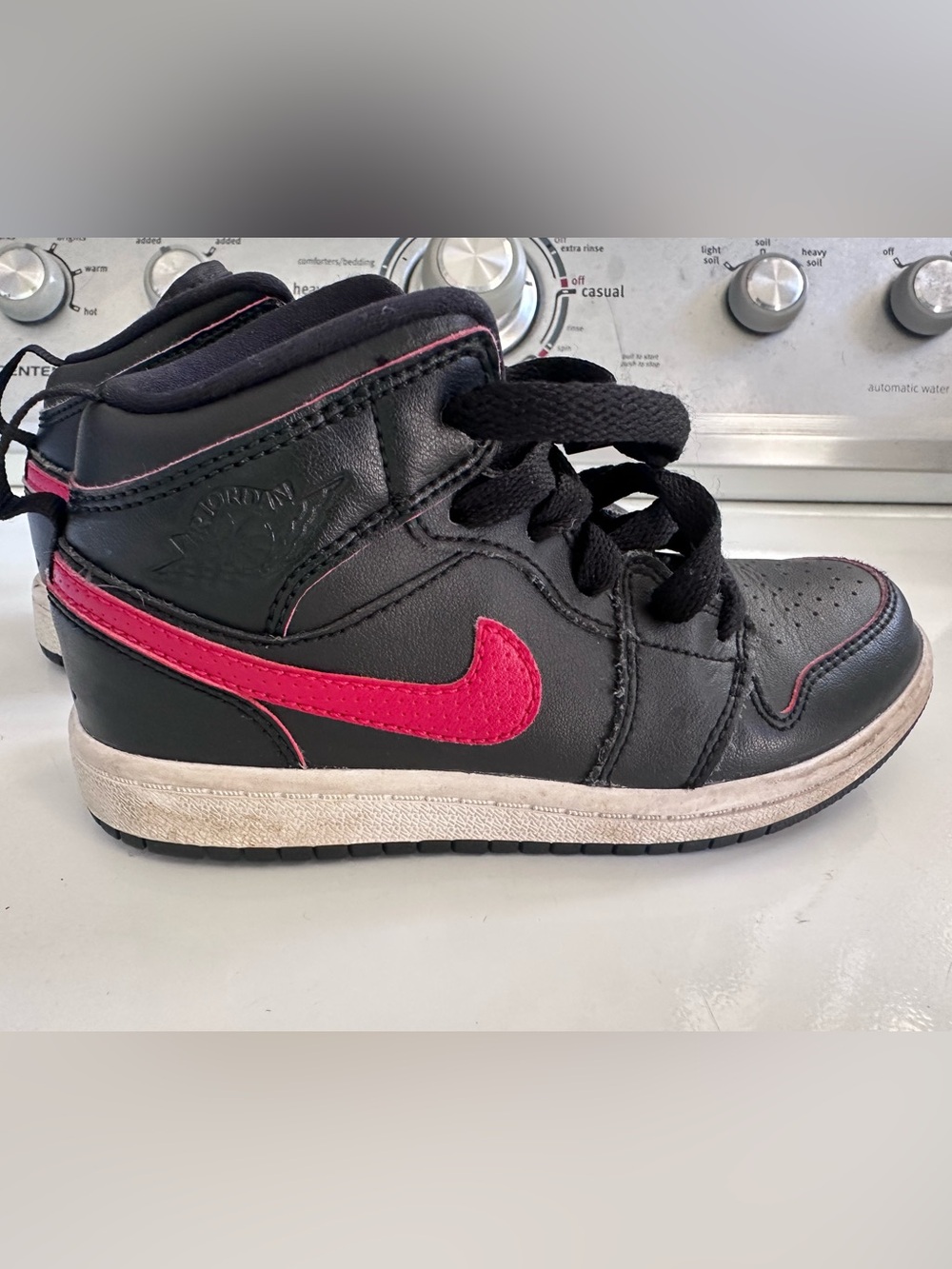 Jordan Kids Black Sneakers with Pink Swoosh